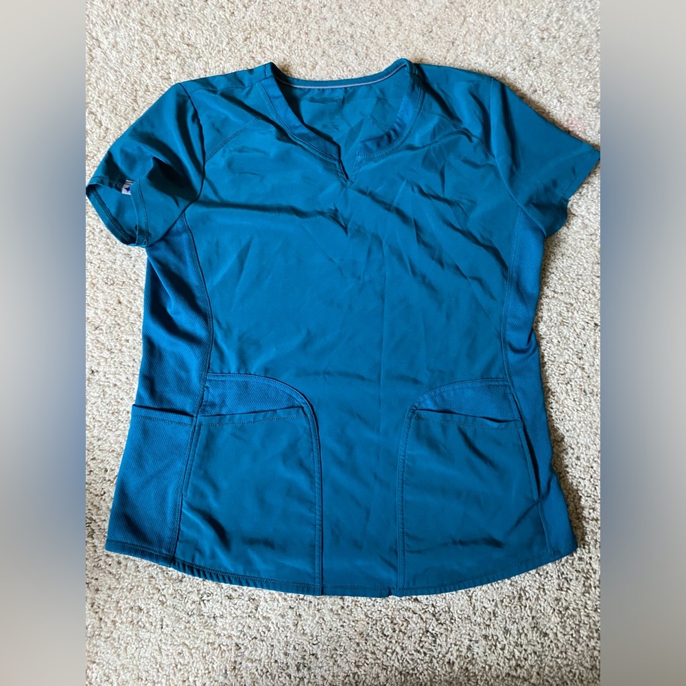 Blue women’s scrub top & pant set